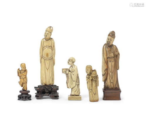 A group of five ivory figures