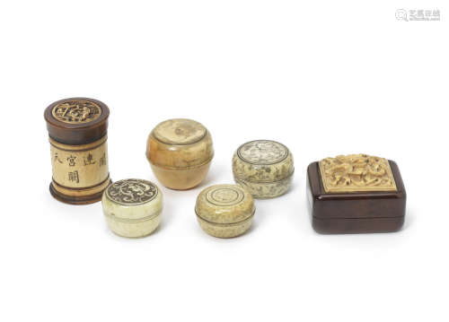 A group of ivory boxes and covers