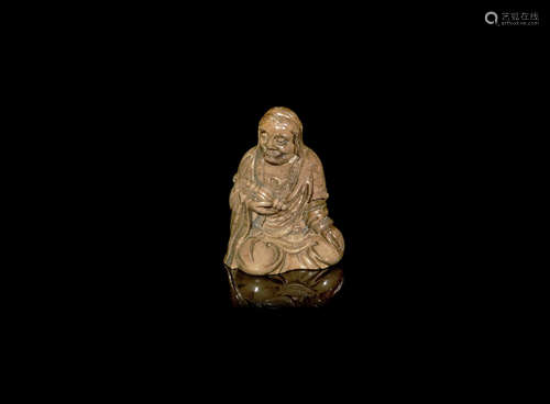 A soapstone carving of a luohan