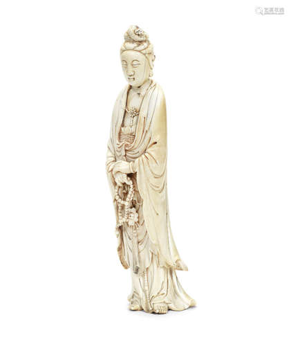 A carved ivory figure of Guanyin