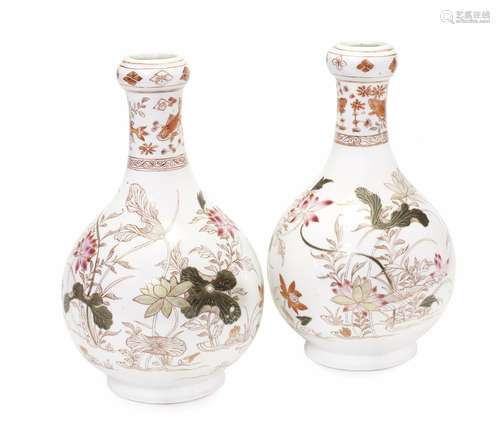 An unusual pair of famille rose and rouge-de-fer bottle vases 18th century