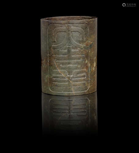 A mottled green and brown jade brush pot