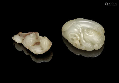 Two pale green jade animal carvings