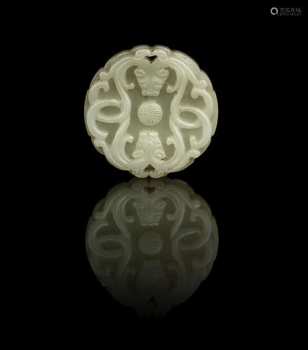 A white jade 'double chilong' pendant plaque