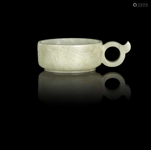 A pale green jade cup