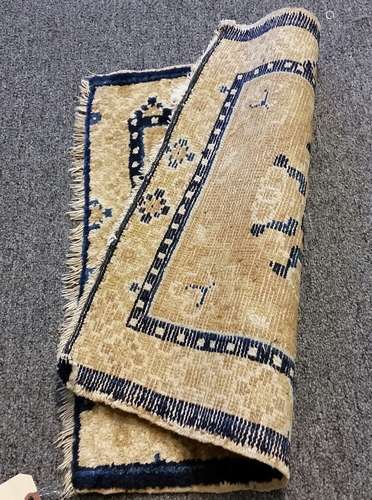 19th century Chinese chair mat. Ivory, blue, and gold decoration.