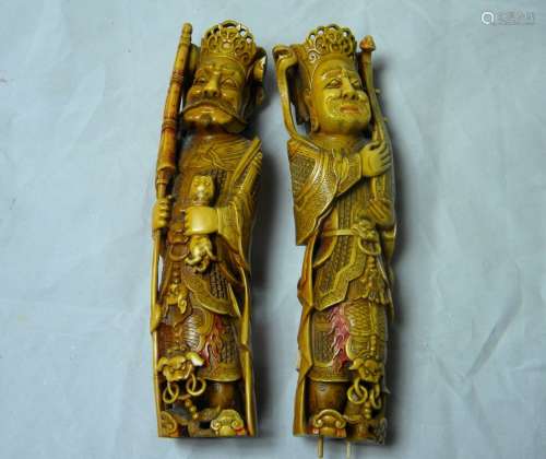 Pair of Carved Warrior Statue