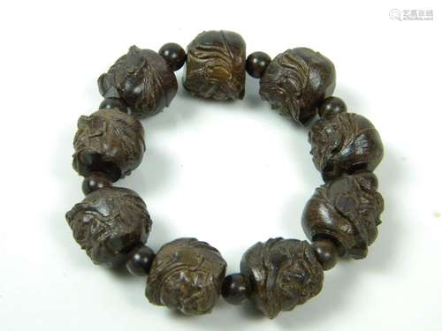 ANTIQUE CHINESE ROSEWOOD BRACELET BUDDHA'S HEAD