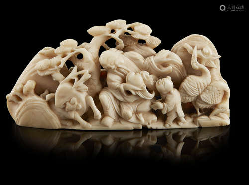 Y CARVED IVORY 'LONGEVITY' BRUSH REST QING DYNASTY, 19TH CENTURY