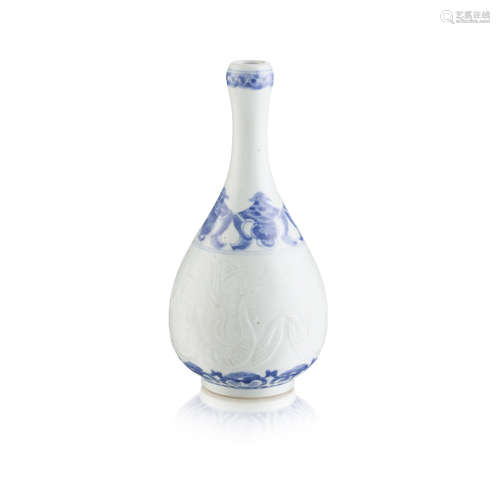 CARVED BLUE AND WHITE 'PHOENIX' BOTTLE VASE GUANGXU MARK AND POSSIBLY OF THE PERIOD