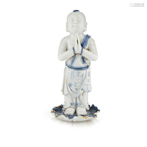 BLUE AND WHITE FIGURE OF A BUDDHIST ACOLYTE MING DYNASTY, WANLI PERIOD