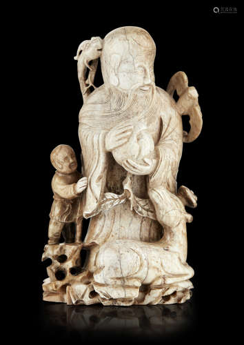 CHICKEN BONE' JADE FIGURE OF SHOULAO QING DYNASTY, 18TH CENTURY