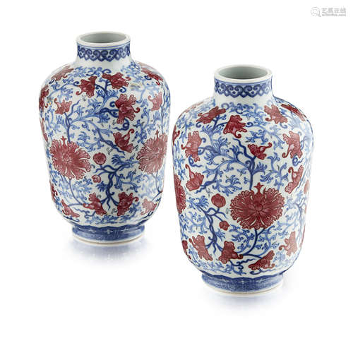 PAIR OF COPPER-RED DECORATED BLUE AND WHITE VASES