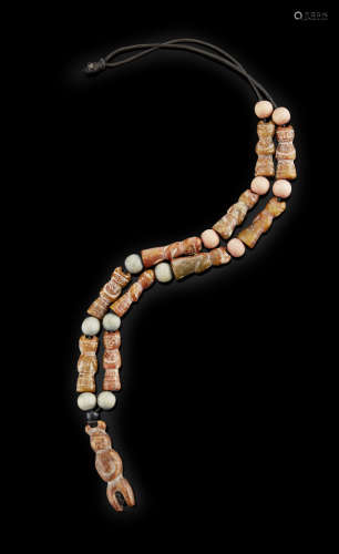 PENDANT NECKLACE COMPOSED OF CARVED JADE FIGURINES LATE NEOLITHIC PERIOD OR LATER