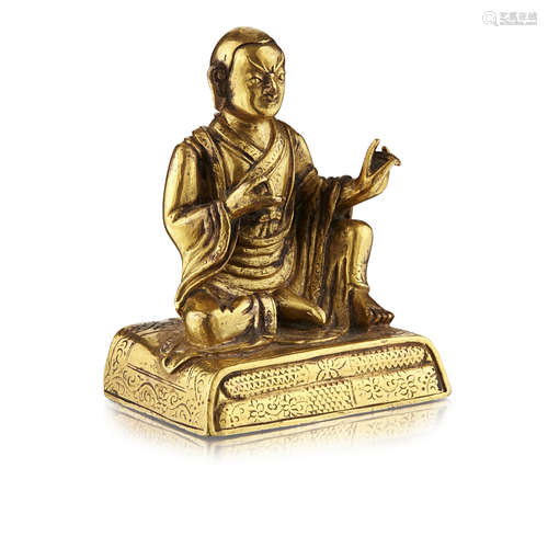 SMALL GILT BRONZE FIGURE OF A LUOHAN QING DYNASTY, 18TH CENTURY