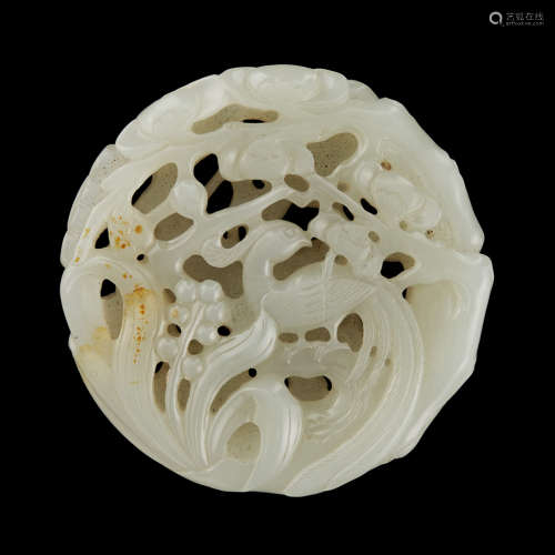 PALE CELADON JADE CIRCULAR PLAQUE QING DYNASTY, 19TH CENTURY