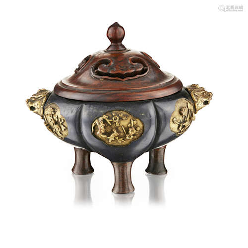 PARCEL-GILT BRONZE TRIPOD CENSER