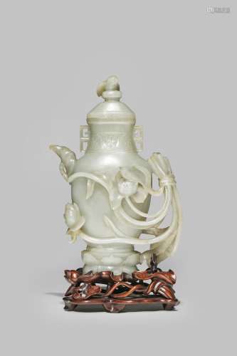 A LARGE CHINESE CELADON JADE EWER AND COVER
