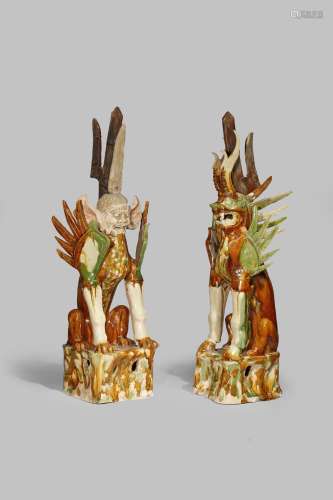 A LARGE PAIR OF CHINESE SANCAI GLAZED EARTH SPIRITS