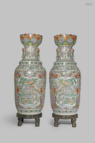 A LARGE AND IMPRESSIVE PAIR OF CHINESE CANTON FAMILLE ROSE VASES