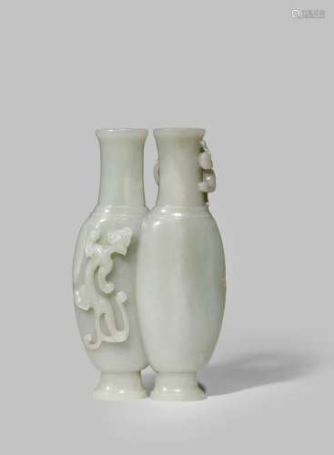 A CHINESE CELADON JADE CONJOINED VASE