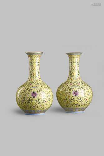 A PAIR OF CHINESE FAMILLE ROSE BOTTLE VASES