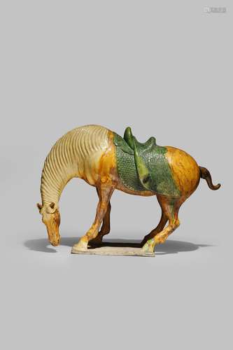 A CHINESE POTTERY TANG-STYLE MODEL OF A HORSE