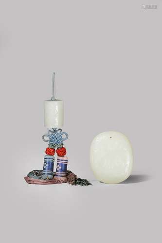 A CHINESE WHITE JADE OVAL PENDANT AND A CYLINDRICAL BEAD