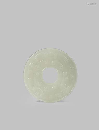 A CHINESE CELADON JADE BI DISC