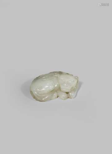 A CHINESE WHITE JADE CARVING OF A MYTHICAL CREATURE