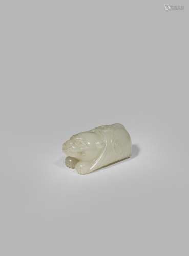 A SMALL CHINESE CELADON JADE CARVING OF A TIGER