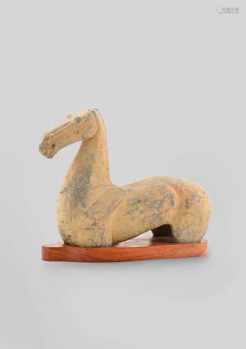 A CHINESE POTTERY MODEL OF A HORSE'S TORSO