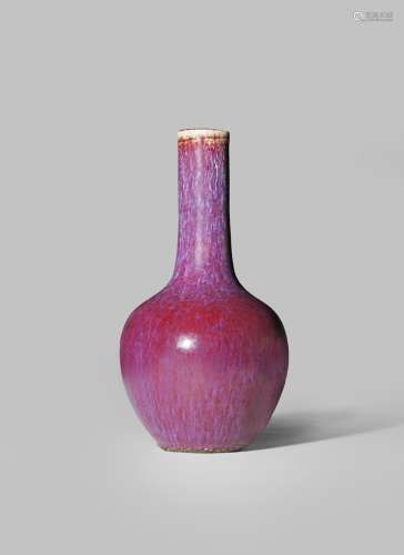 A SMALL CHINESE FLAMBE GLAZED BOTTLE VASE