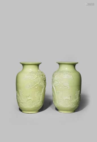 A PAIR OF CHINESE LIME GREEN MOULDED VASES