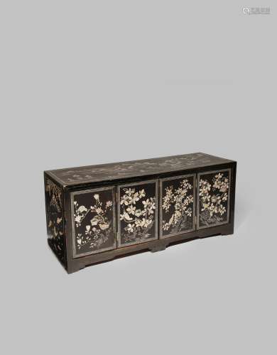 A KOREAN BLACK LACQUER AND MOTHER OF PEARL INLAID LOW CABINET