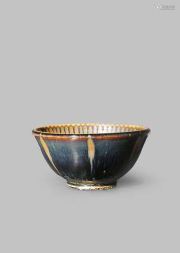 AN UNUSUAL CHINESE BROWN GLAZED BOWL