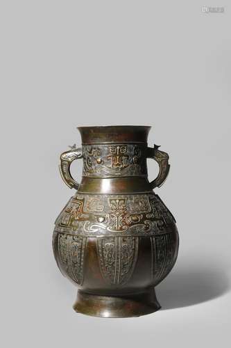 A LARGE CHINESE BRONZE HU-SHAPED VASE