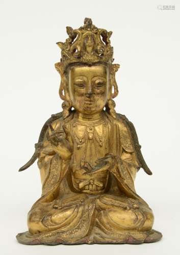 A Chinese gilt bronze Buddha, Ming, H 27,5 cm (traces of polychromy)