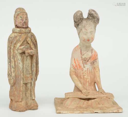 A Chinese earthenware funerary figure of a sitting female musician, Tang-Dynasty; added a Chinese earthenware funerary figure of a warrior, Northern Wei-dynasty, H 18,5 cm