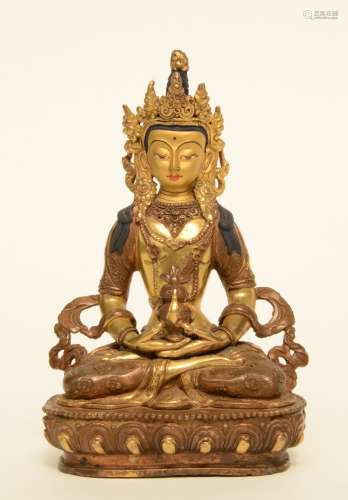 A Tibetan gilt bronze Buddha, H 20 cm