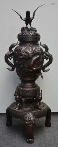 An impressive Japanese bronze incense burner with dragon relief decoration, late 19thC, H 141 cm