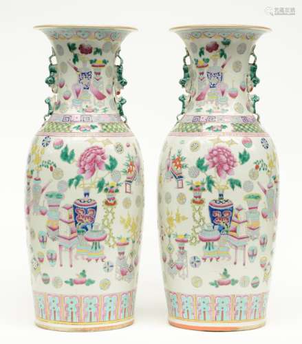 A pair of Chinese famille rose vases decorated with antiquities and symbols, 19thC, H 59 cm (one vase with a crack on the body)
