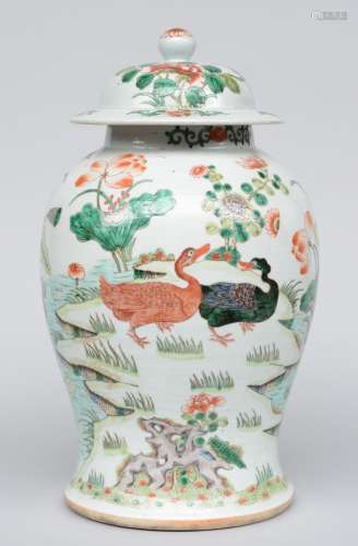 A Chinese famille verte vase with cover, decorated all around with ducks in a pond, 19thC, H 44 cm (firing fault on the inside of the neck)