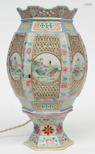 A Chinese hexagonal polychrome wedding lantern with openwork decoration on a matching base, the roundels painted with garden scenes, mounted into a lamp, 19thC, H 39 cm (firing fault on the neck and chips on the base)