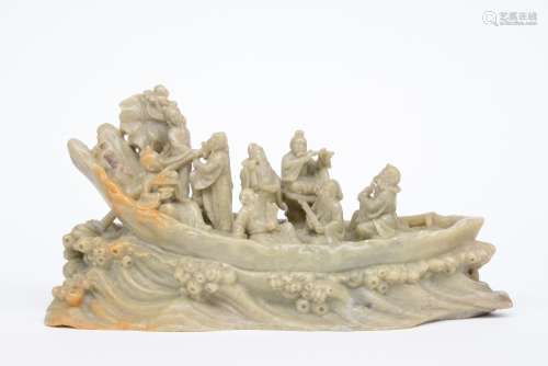 A Chinese steatite sculpture representing the Eight Immortals, H 13 cm - W 25,5 cm