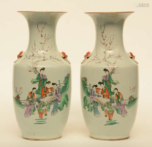 A pair of Chinese polychrome vases, decorated with an animated scene, H 44 cm
