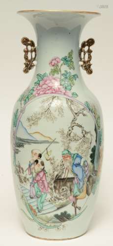 A Chinese polychrome decorated vase depicting a Sage with children, H 57 cm (starcrack on the bottom)