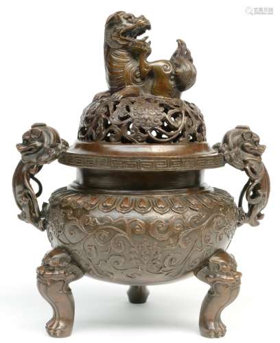 A Chinese bronze incense burner, relief moulded with mythological animals, with a Xuande-mark, H 27 cm