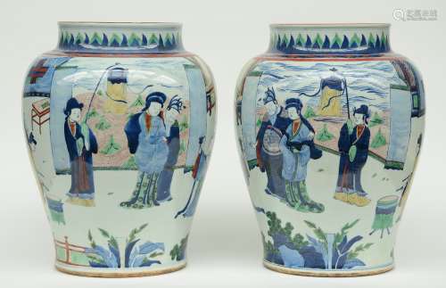 A pair of exceptionnel Chinese wucai vases, overall decorated with an animated scene, H 49 cm (one vase with a minor firing fault on the body)