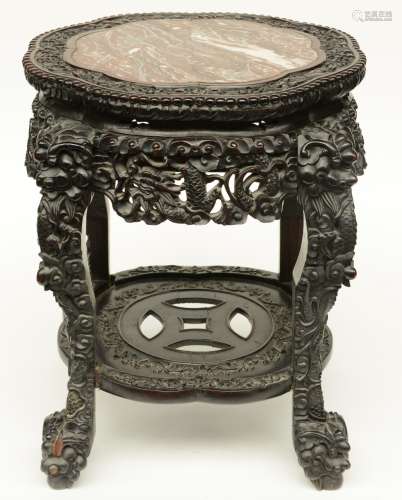 A Chinese carved hardwood stool with marble top, H 53,5 - Diameter 52,5 cm (minor damage)